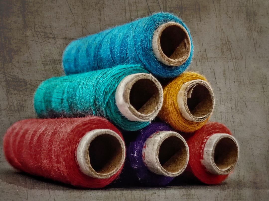 Photo by :) :) blue red and yellow thread rolls